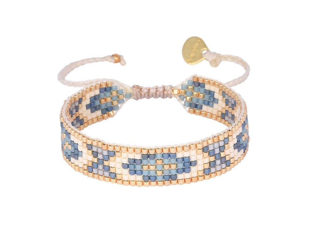 Narrow Blue, Gold, and Ivory Woven Bead Bracelet.