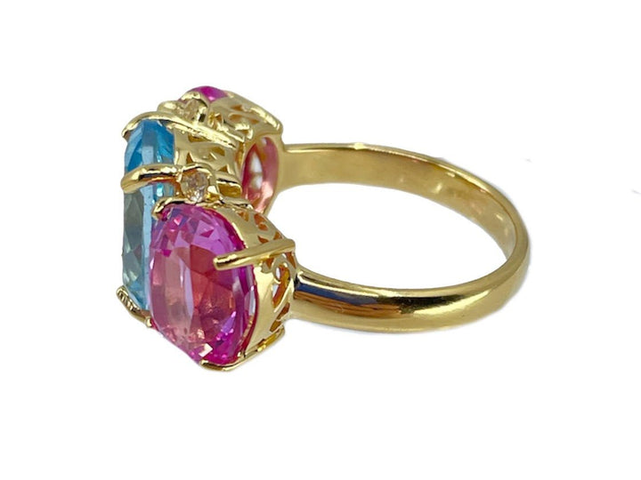 Three-Stone Blue Topaz and Pink Sapphire Ring with White Topaz