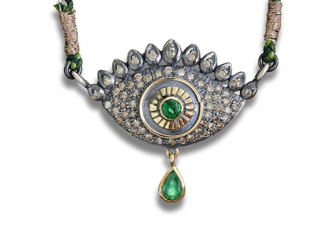 SS/10k Gold, Emerald, and Diamond Eye Pendant on Woven Cord