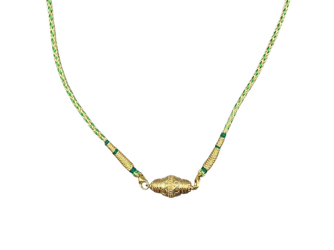 Gold Prana Charm on Green Indian Cord Necklace