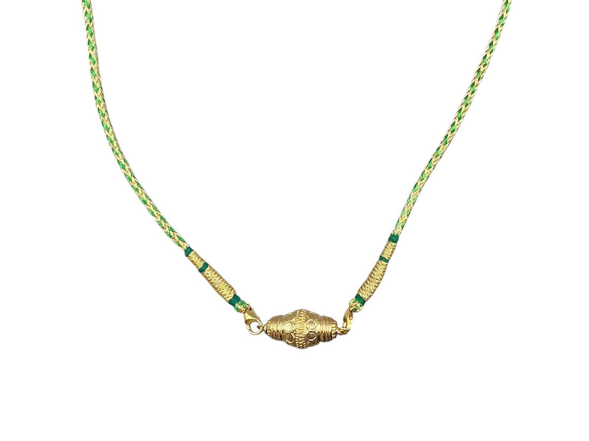Gold Prana Charm on Green Indian Cord Necklace