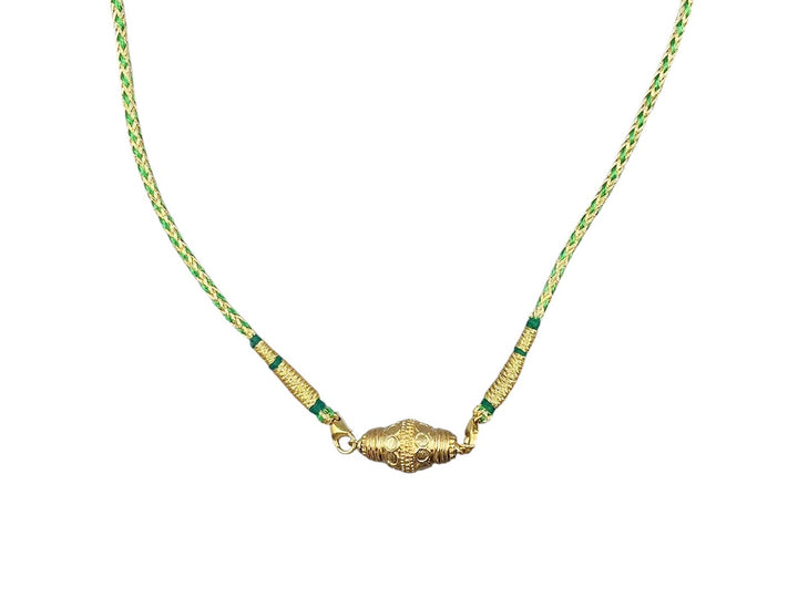 Gold Prana Charm on Green Indian Cord Necklace