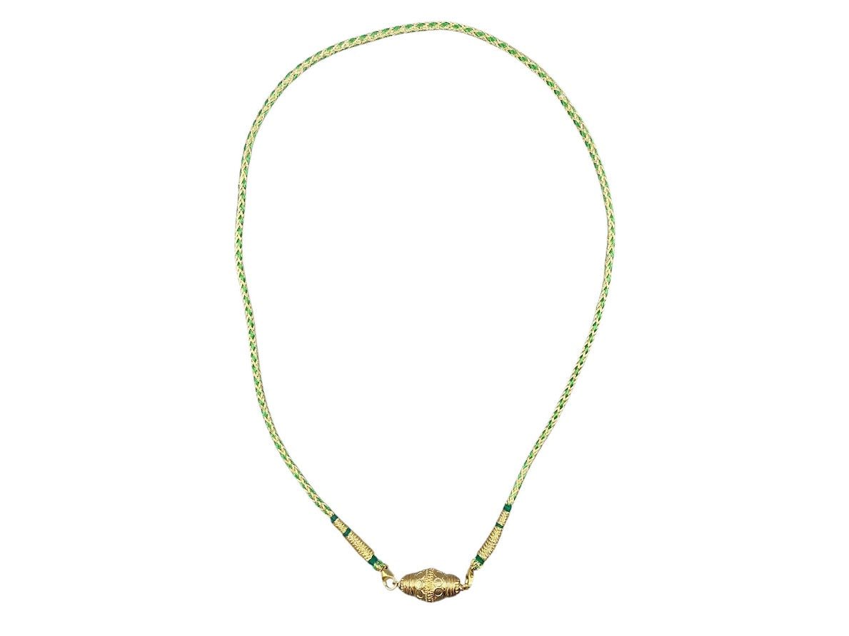 Gold Prana Charm on Green Indian Cord Necklace