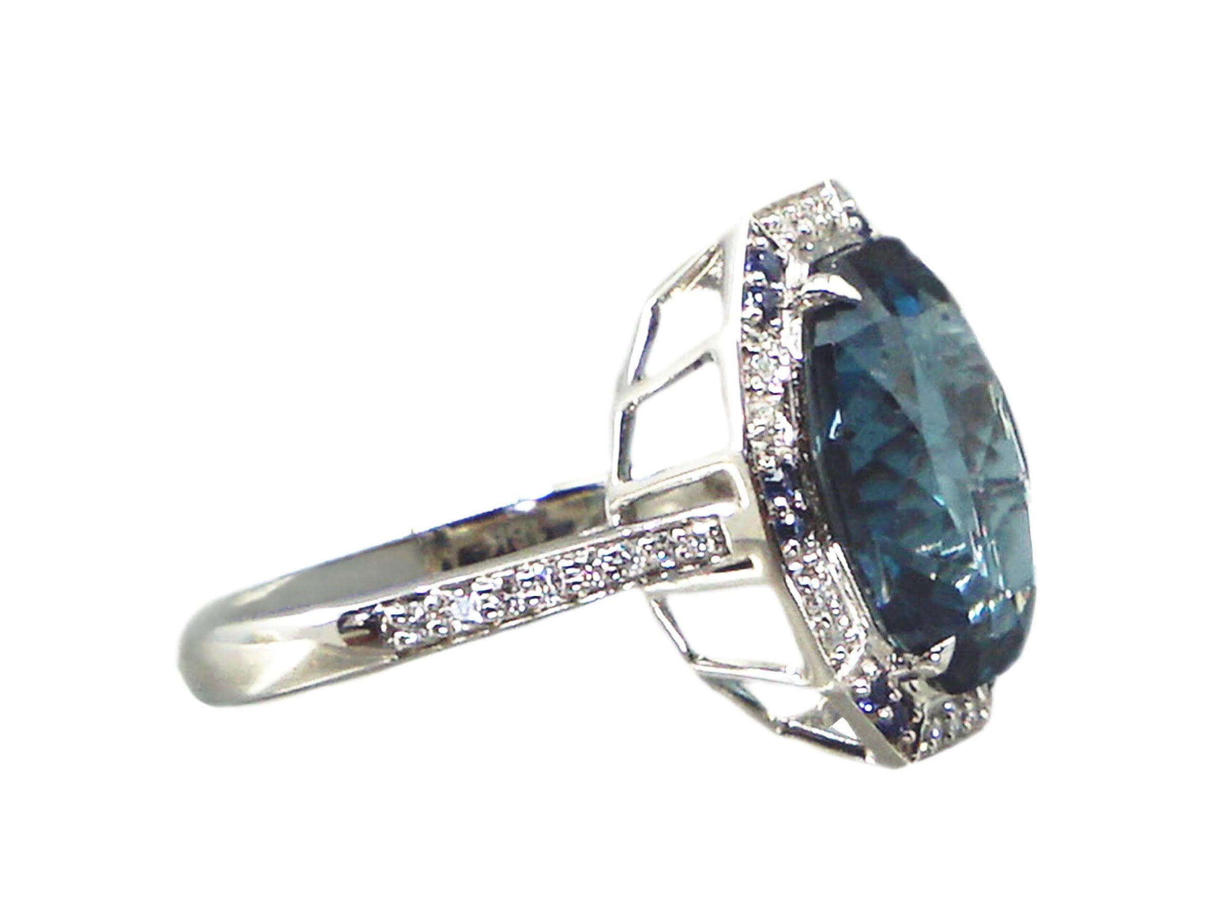 18k Ring with Topaz, Diamonds, and Sapphires
