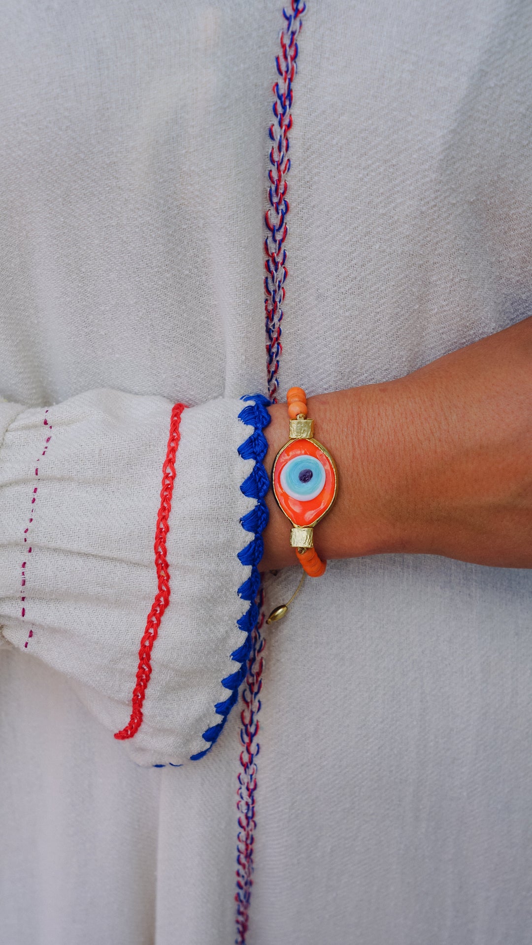 Large Orange Blown Glass Evil Eye Bracelet