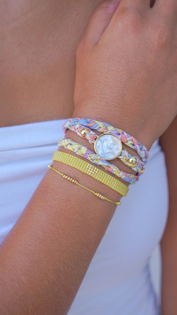 Yellow Thread Bracelet with Gold Rings and Tassels