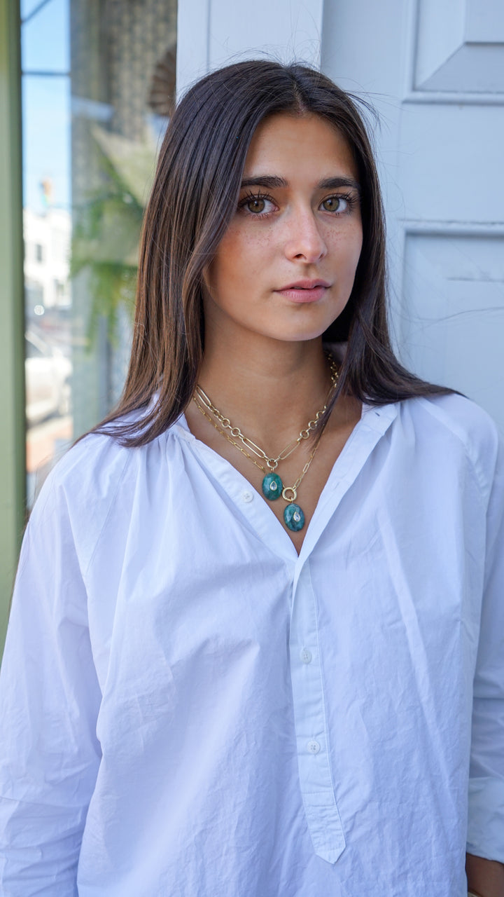Faceted Emerald Charm with Pear-Shaped Blue Topaz