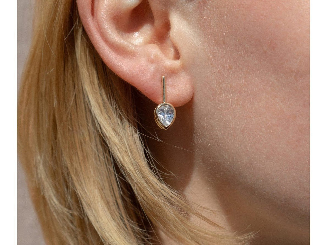 Gold Drop Down Stud Earrings with Teardrop CZs