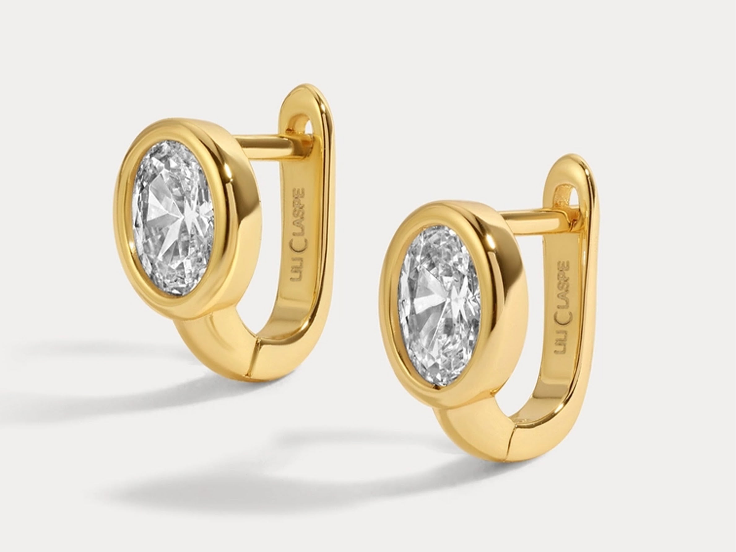 Oval CZ Huggie Earrings