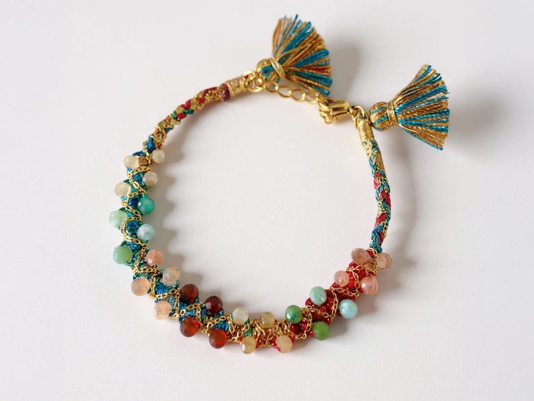 Woven Bracelet with Gemstones and Pompoms