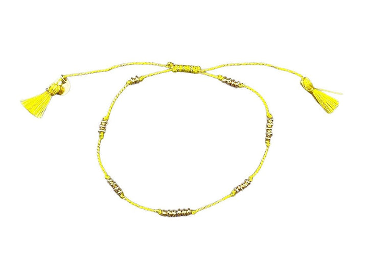 Yellow Thread Bracelet with Gold Rings and Tassels