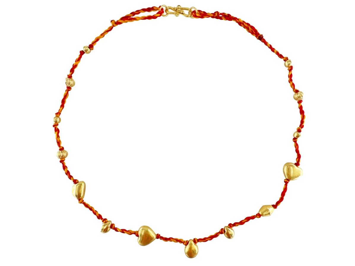 Red and Yellow Beaded Necklace with Various Charms