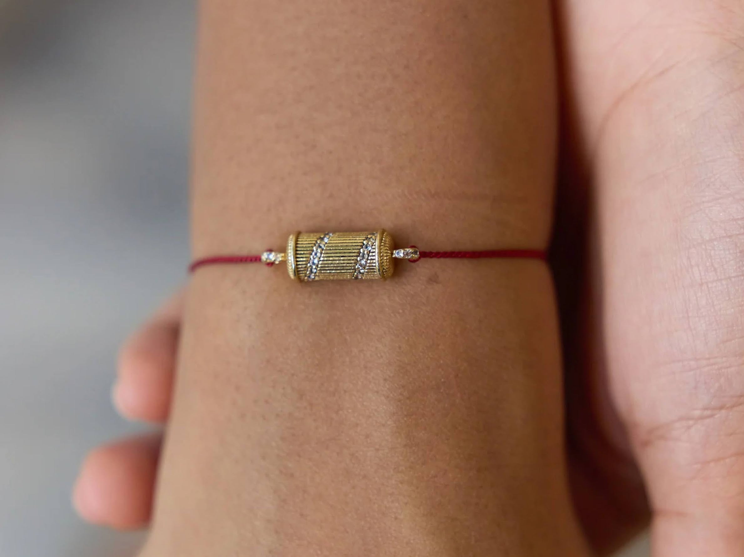Red Thread Bracelet with Spiral Charm