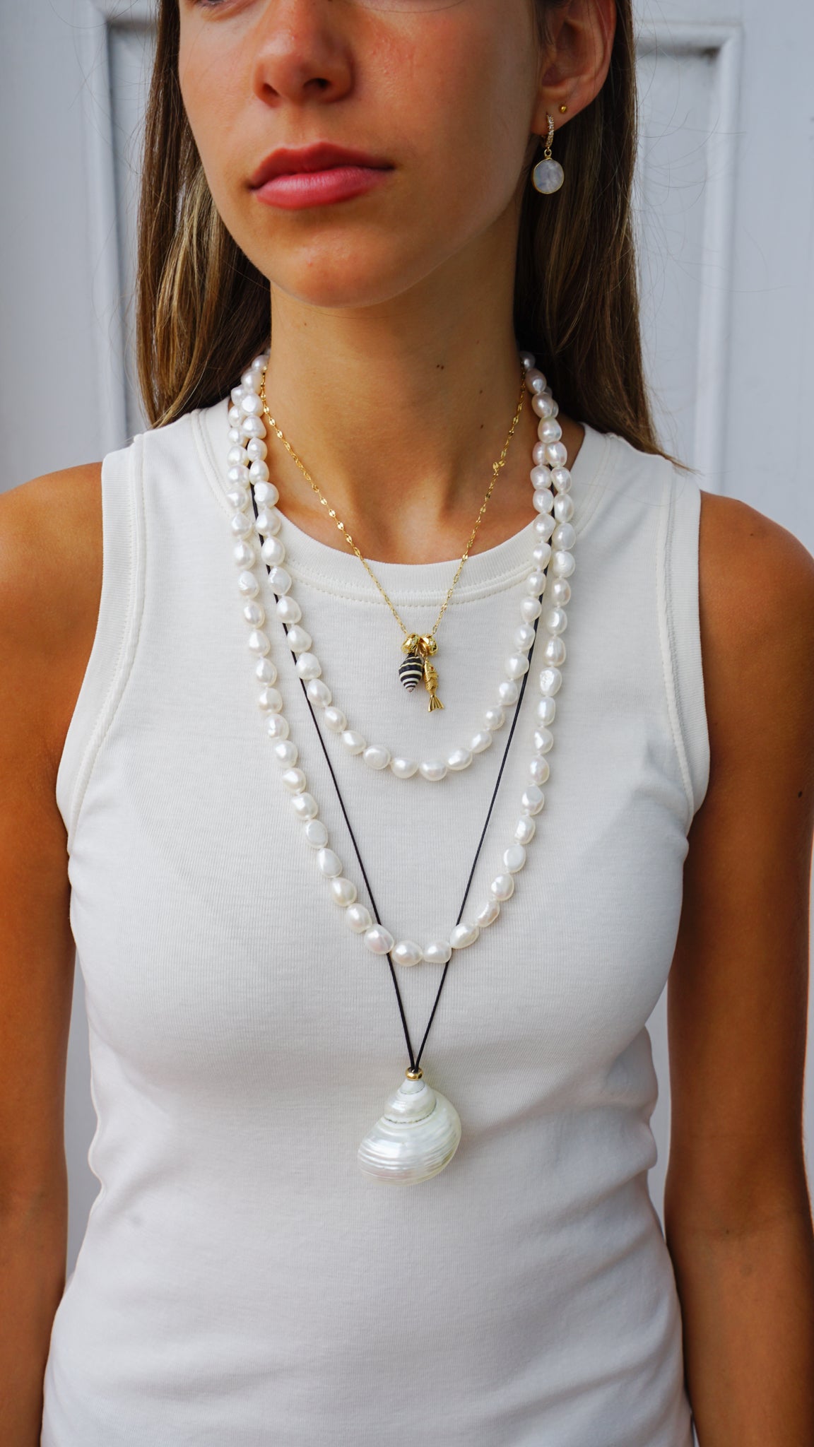 Turbo Shell on Cotton Cord Necklace