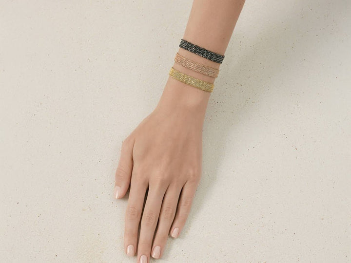 Gold Woven Chain Bracelet with Gray Silk Cord